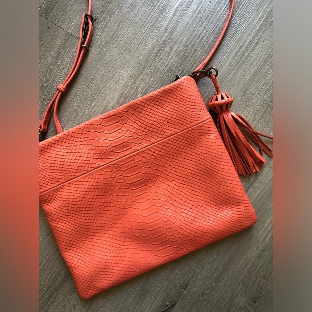 Coral orange pink crocodile the SAK cross body purse